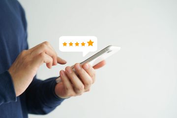 customer-pressing-smartphone-give-gold-five-star-rating-feedback